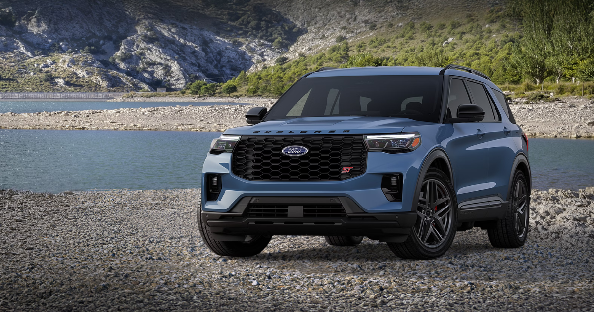 a blue 2026 Ford Explorer parked in front of a creek in the wilderness