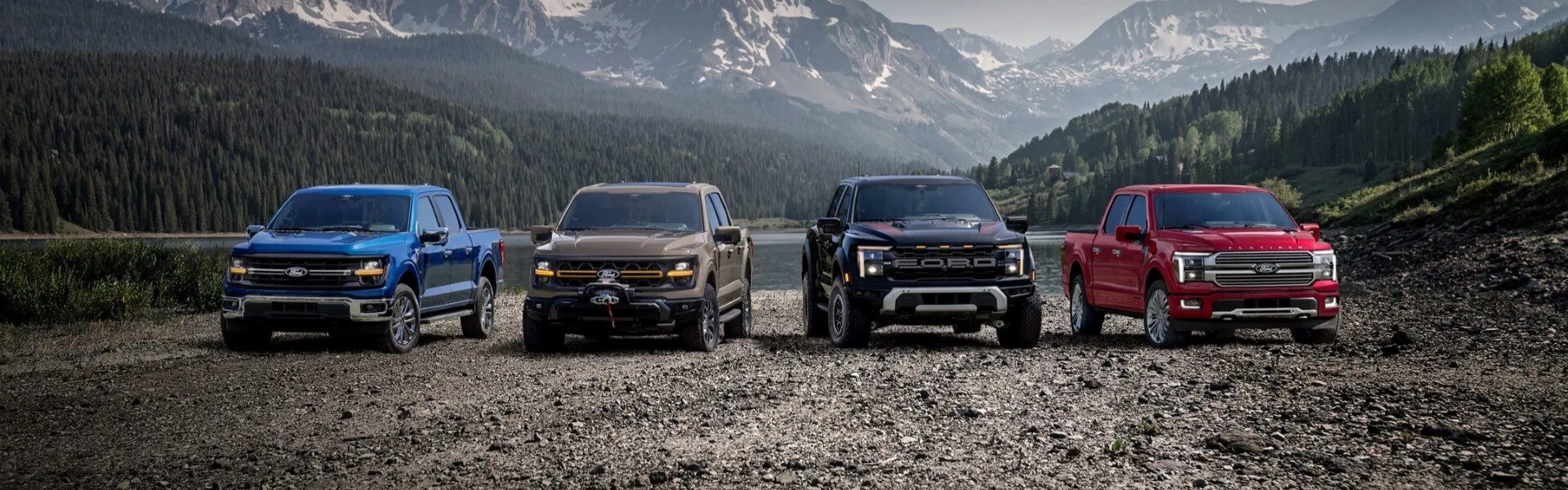 A ford lineup with a beautiful mountain and river backdrop